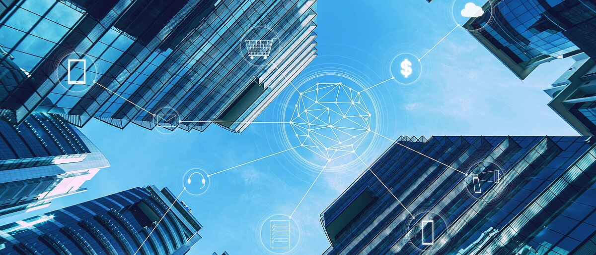 Mehrere Hochhäuser werden durch Linien miteinander vernetzt